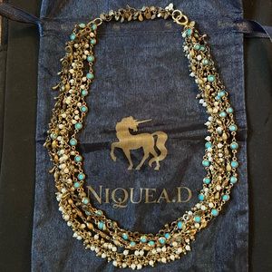 NIQUEA.D Multi-Layered Beaded Necklace